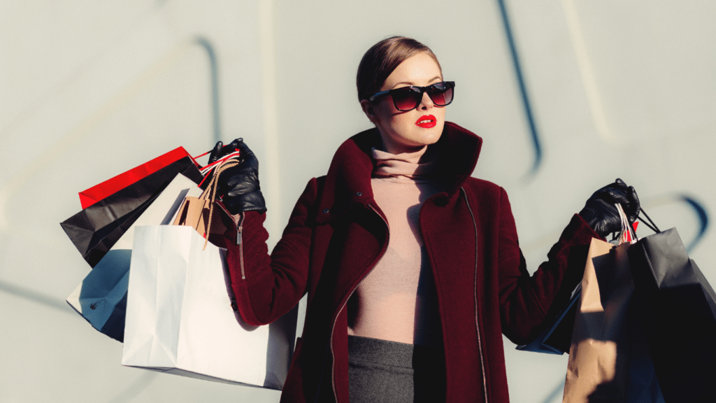 Woman on holding a beauty shopping bag