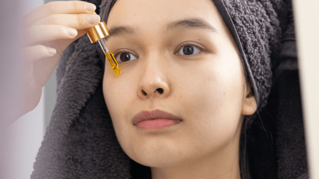 Woman applying serum